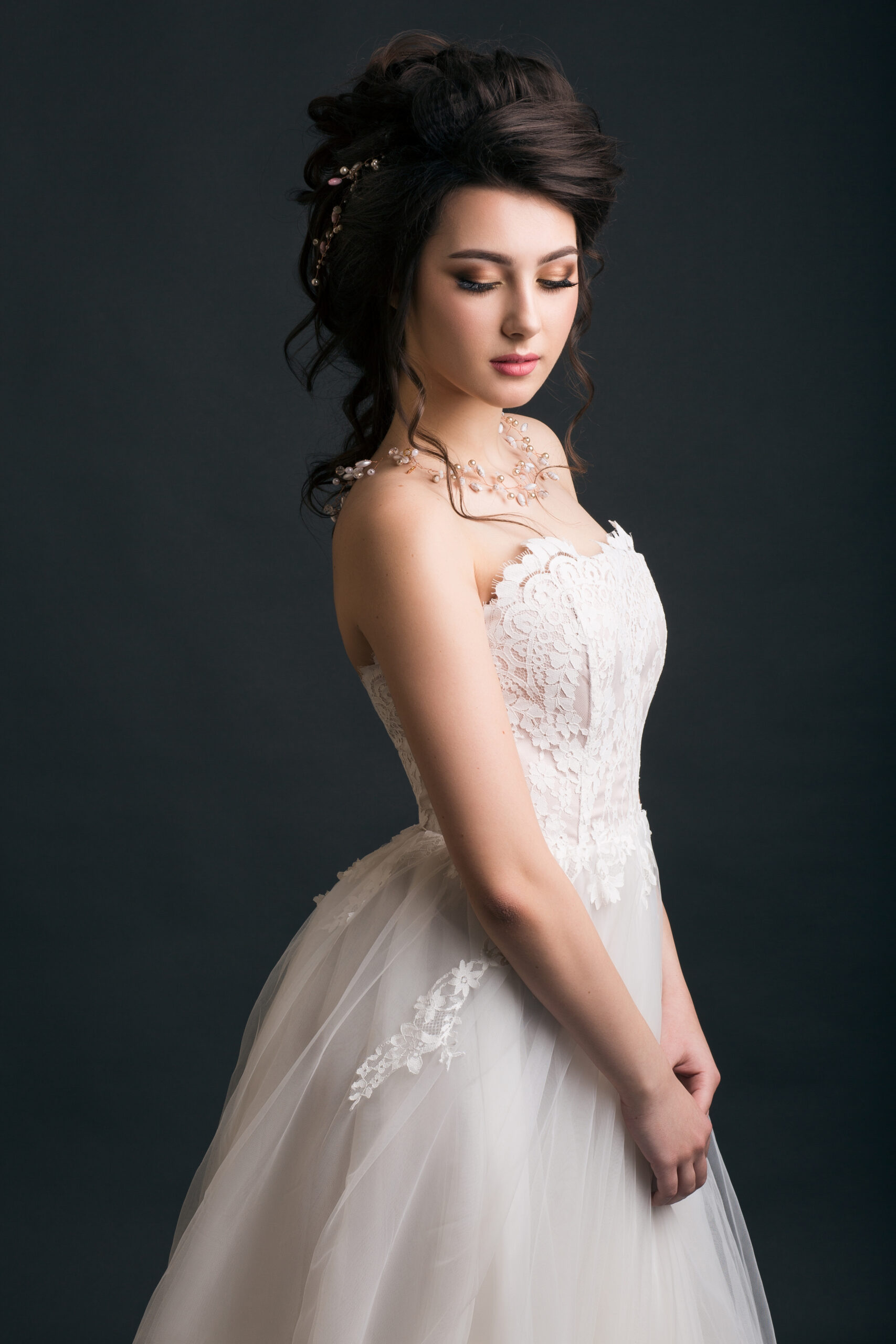 young beautiful stylish woman, bride, bridal fashion, spring trend, hairstyle, beauty make-up, white dress, tenderness, innocence, dark background